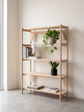 Collapsible plywood bookshelf display for craft fairs and markets, updated hero photo, CNC cut in our shop