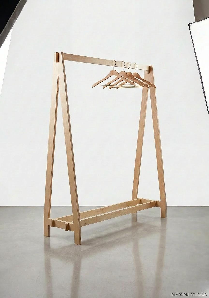 Birch plywood garment display rack with hanging bar, alternate view, CNC cut in our shop