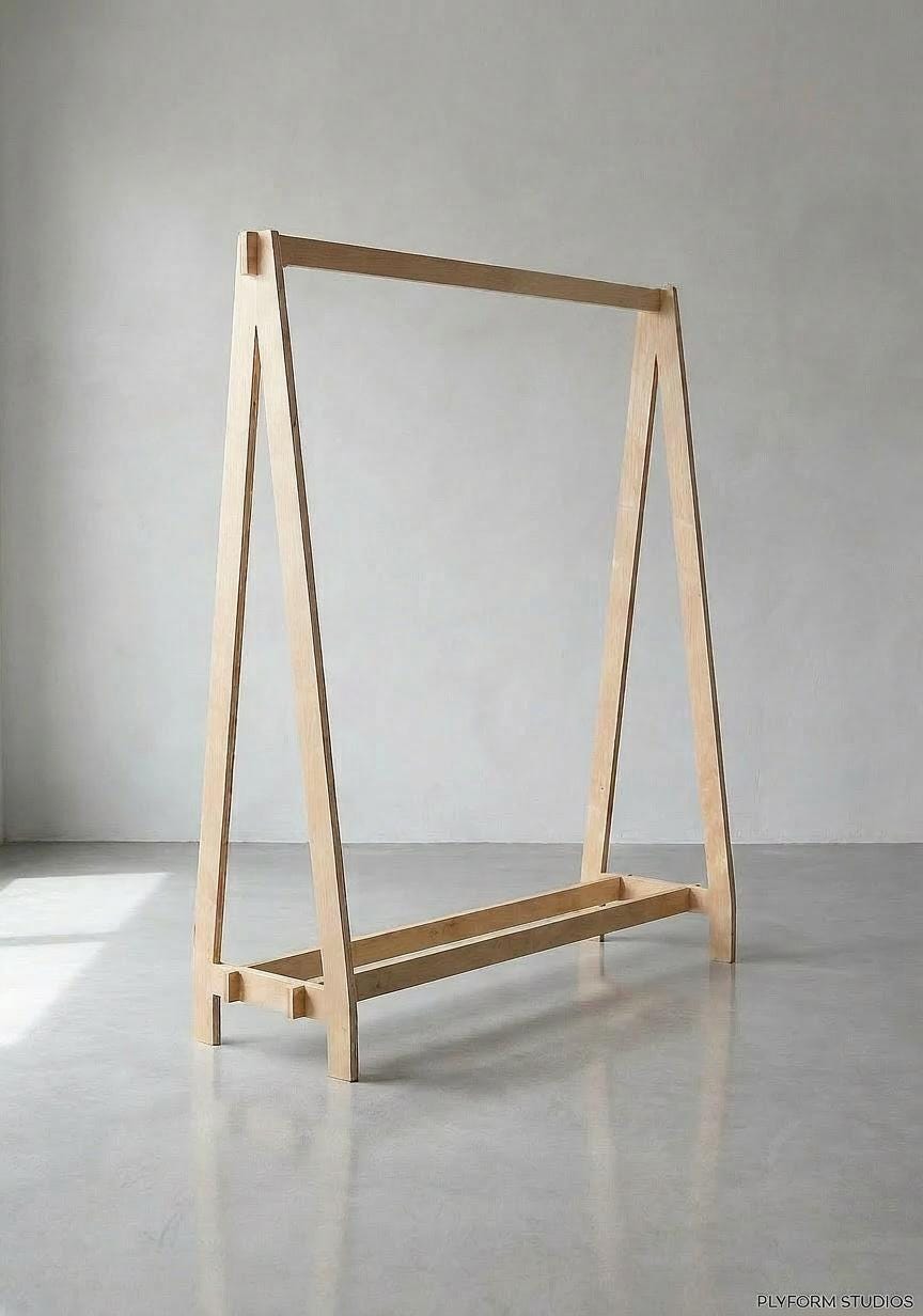 Flat pack plywood clothing rack for boutiques and pop up shops, updated hero photo, CNC cut in our shop