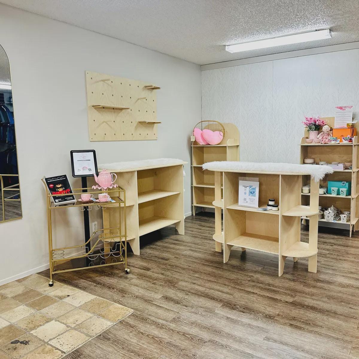 Flat pack kiosk counter with double rounded ends and open shelving, additional view, CNC cut in our shop