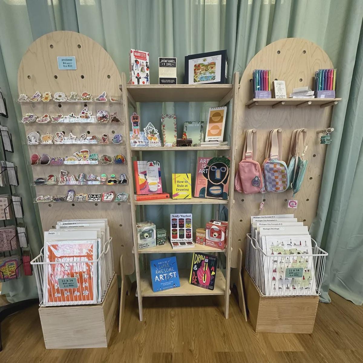 Curved top freestanding plywood pegboard retail stand, alternate view, CNC cut in our shop