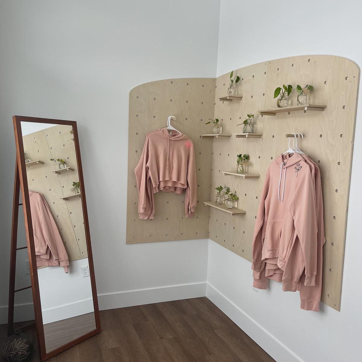 Arched top plywood pegboard display, alternate angle, CNC cut in our shop