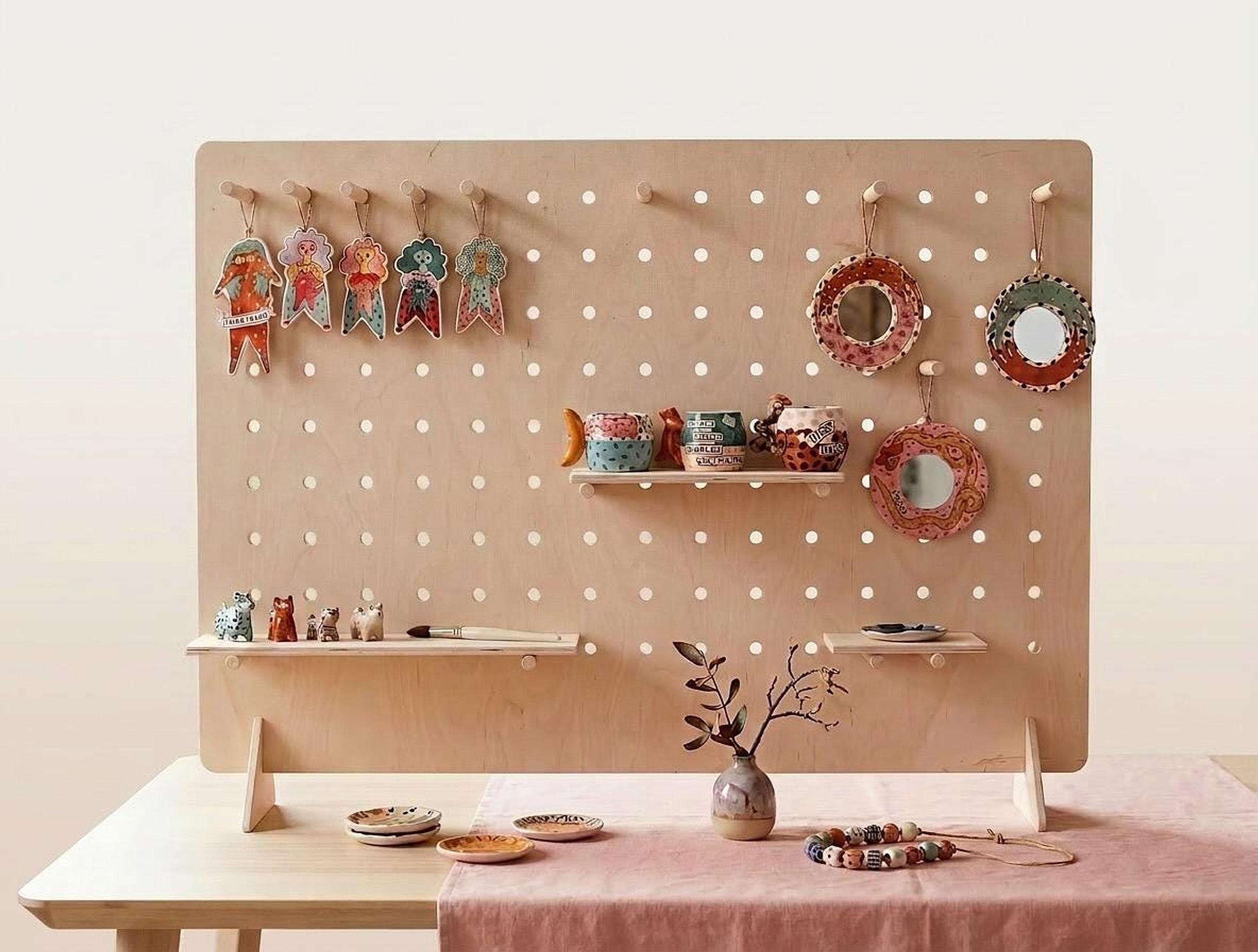 Birch plywood tabletop pegboard display stand, updated hero photo, CNC cut in our shop
