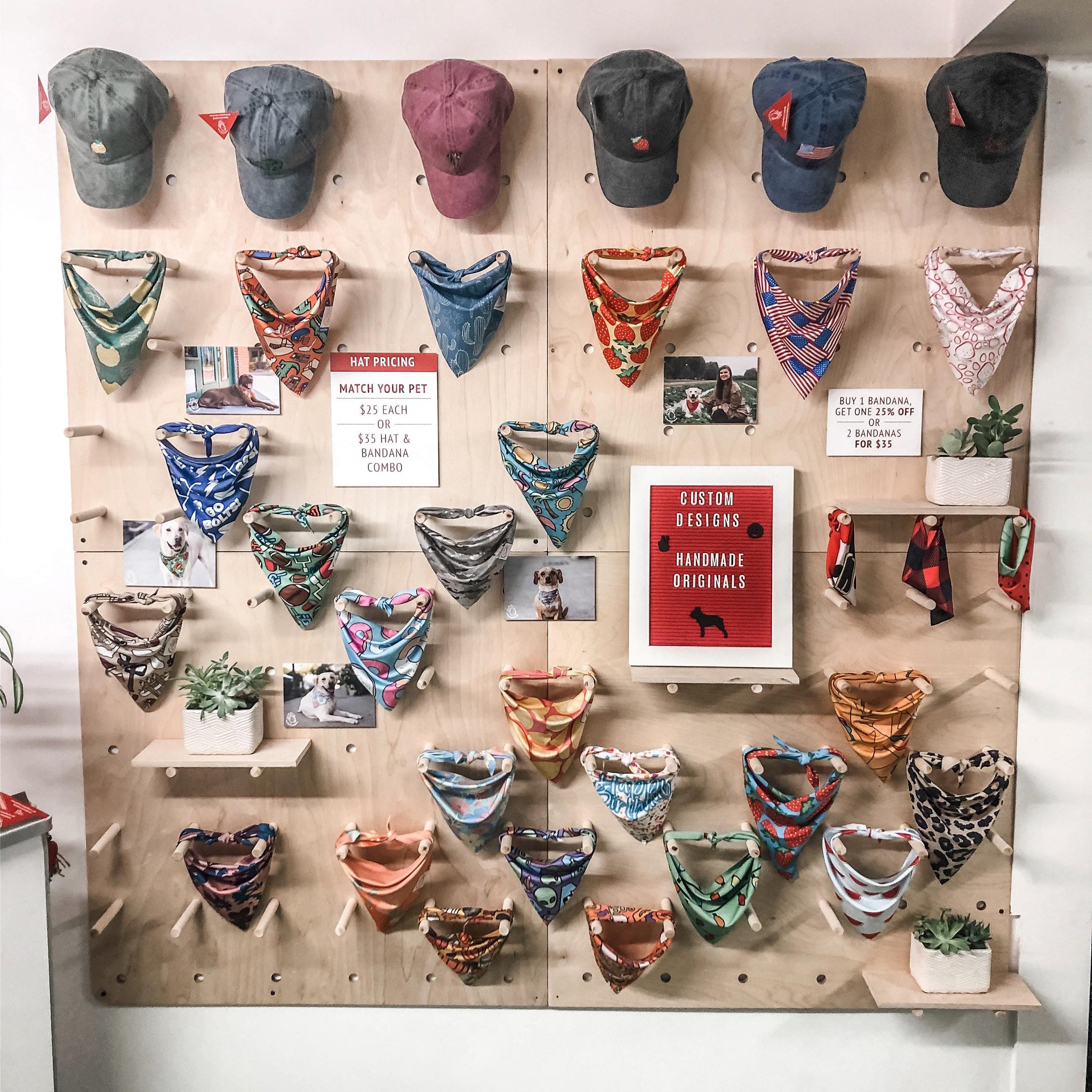 Modern wooden pegboard wall with adjustable shelving, product view, CNC cut in our shop