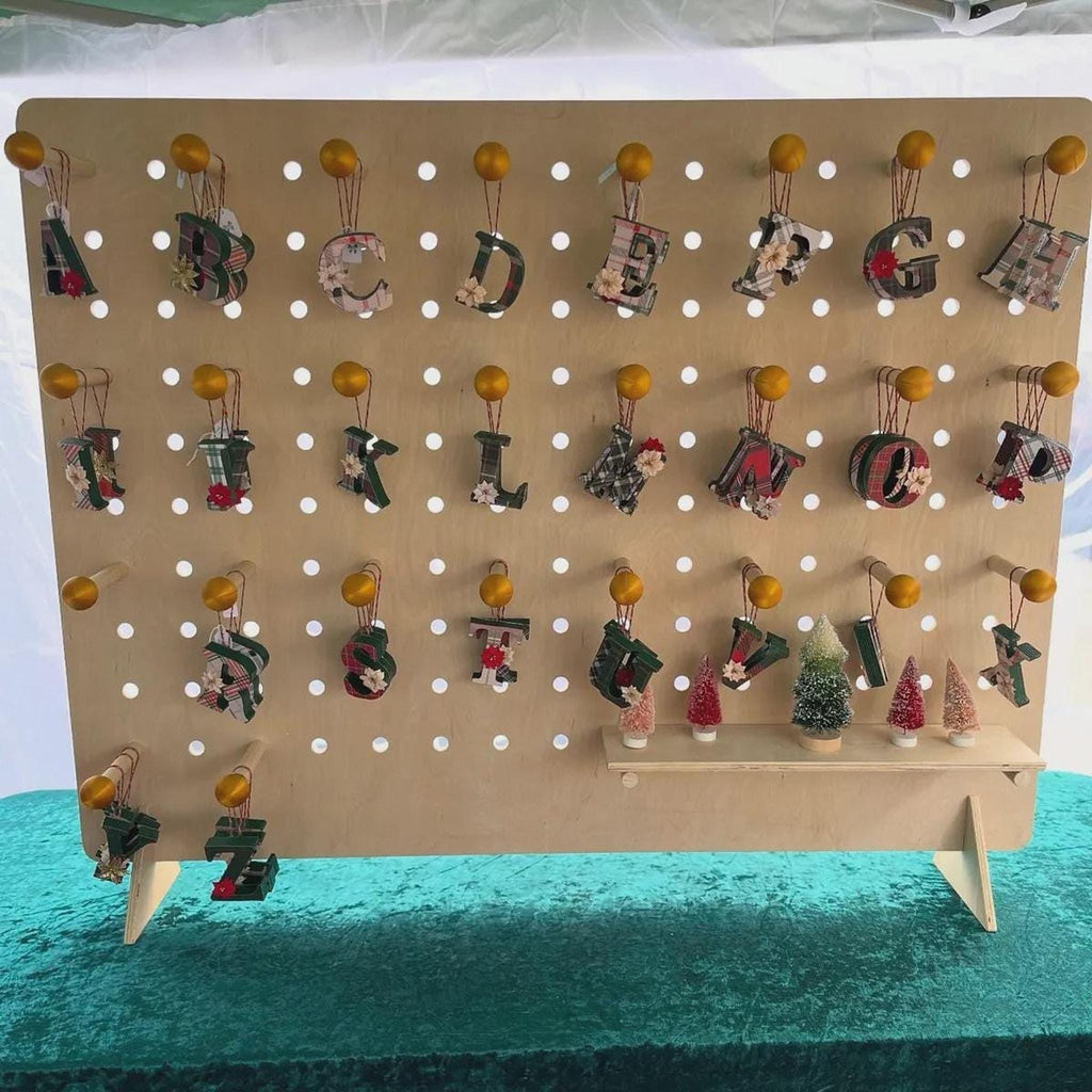 Tabletop birch plywood pegboard stand for craft fairs, alternate view, CNC cut in our shop