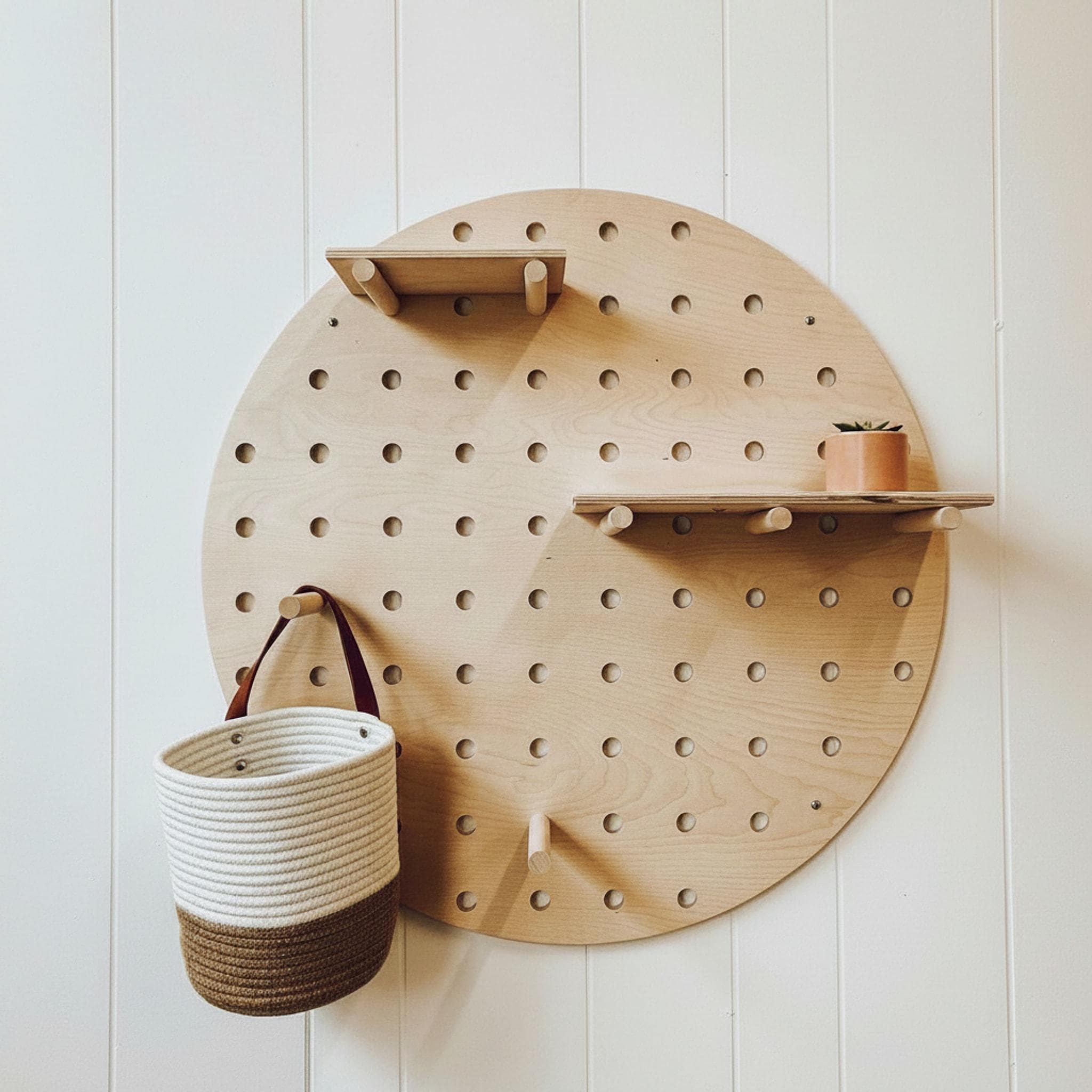 Round pegboard wall organizer, detail view, CNC cut in our shop
