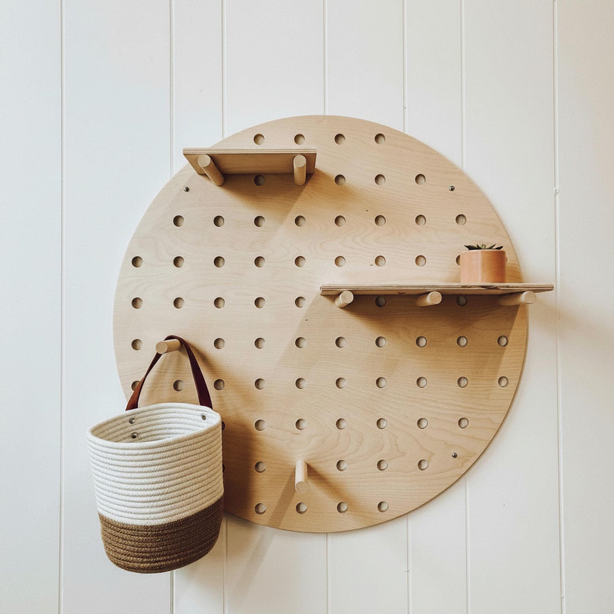 Circle wooden pegboard display, additional view, CNC cut in our shop