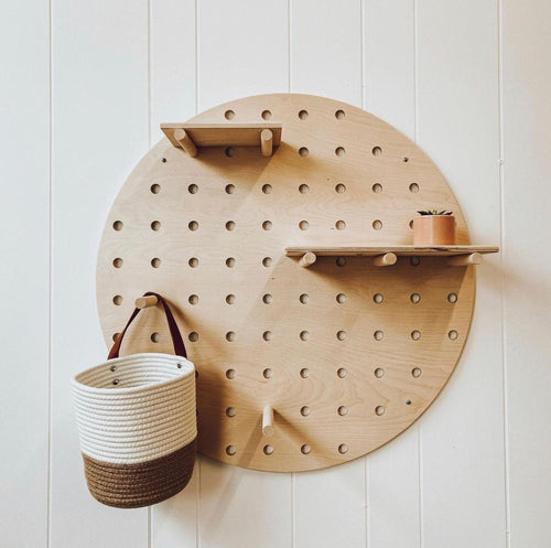 Round birch plywood pegboard wall display with floating shelves, updated hero photo, CNC cut in our shop