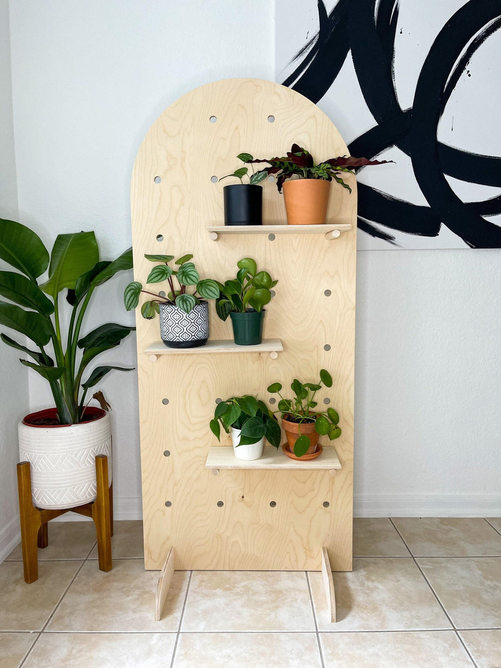 Birch plywood curved pegboard display, detail view, CNC cut in our shop