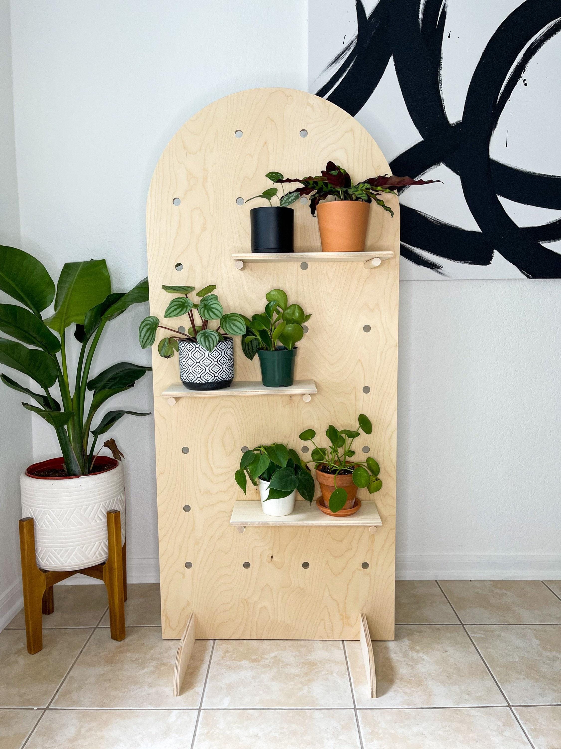 Birch plywood curved pegboard display, detail view, CNC cut in our shop