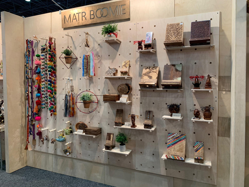Wood pegboard wall with adjustable shelves for home organization and retail, updated hero photo, CNC cut in our shop