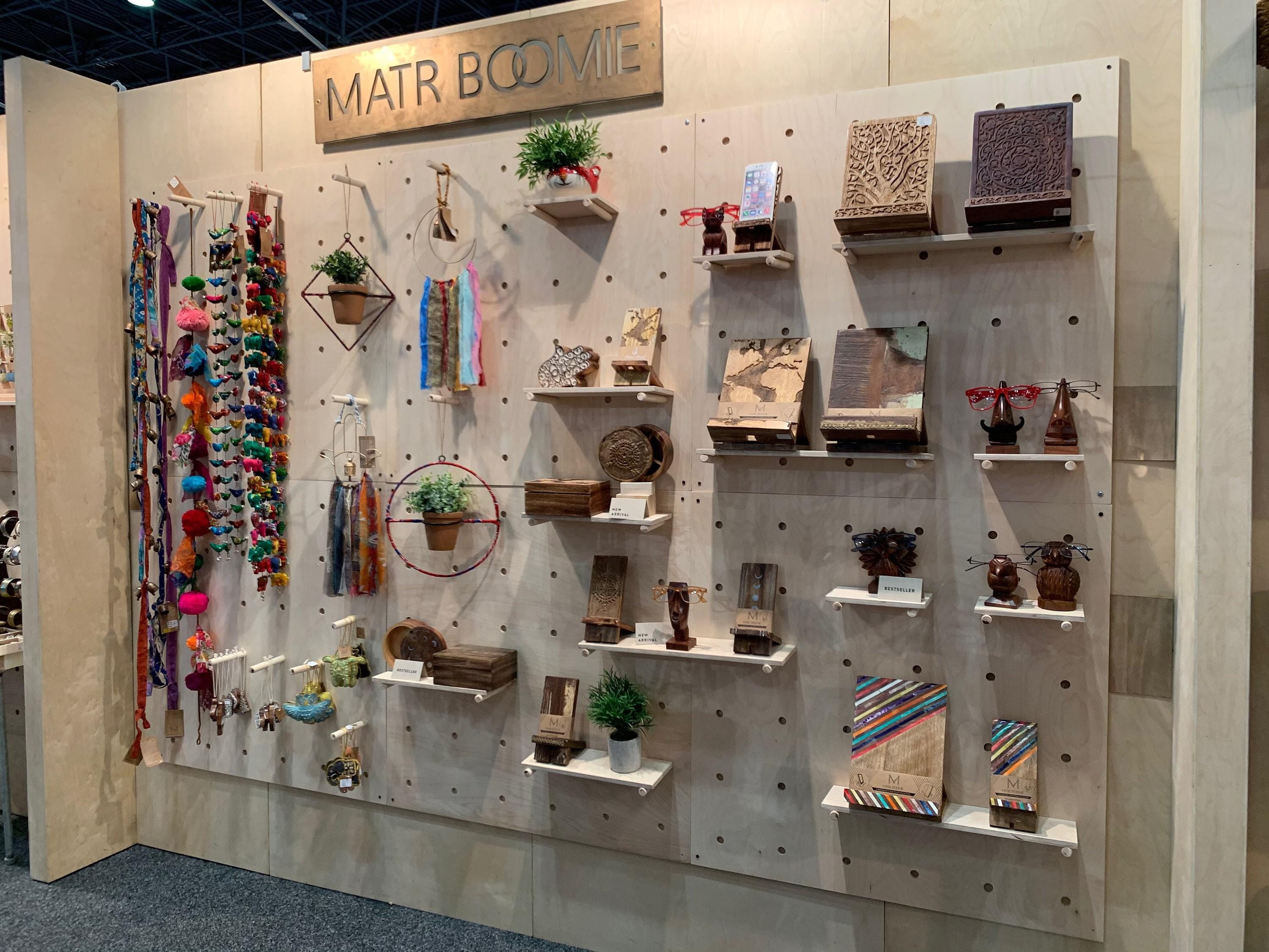 Wood pegboard wall with adjustable shelves for home organization and retail, updated hero photo, CNC cut in our shop