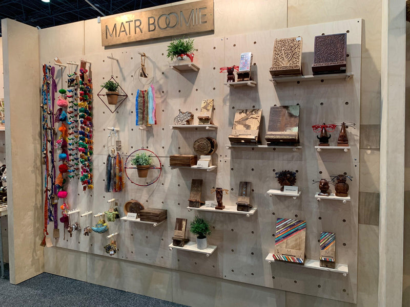 Wood pegboard wall with adjustable shelves for home organization and retail, updated hero photo, CNC cut in our shop